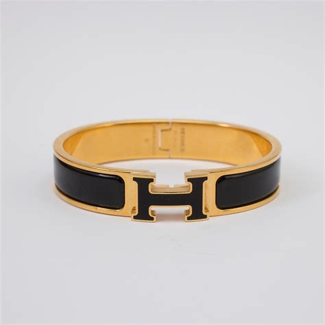 hermes men bracelet gold and black|hermes black enamel bracelet.